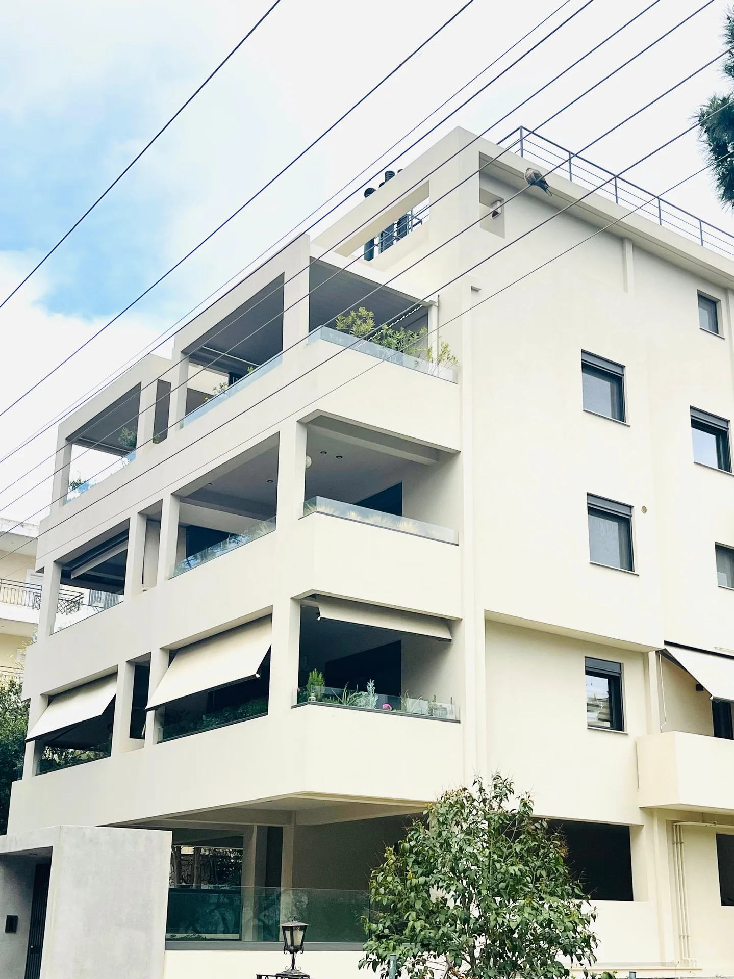 Vrilissia | Dodekanisou Project · Photograph · Completed residential facade and balconies.